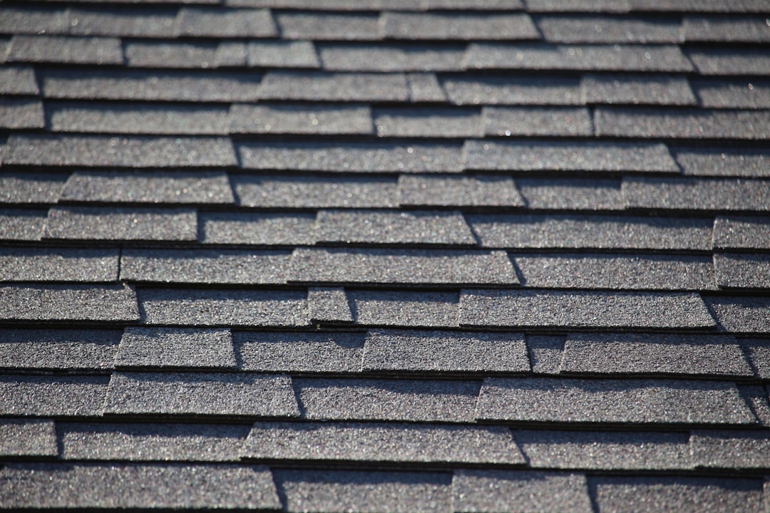 Close-up of architectural asphalt shingles installed on a residential roof